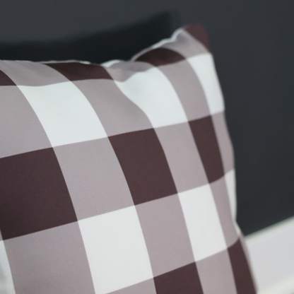 Checkered pillowcase with a dark background